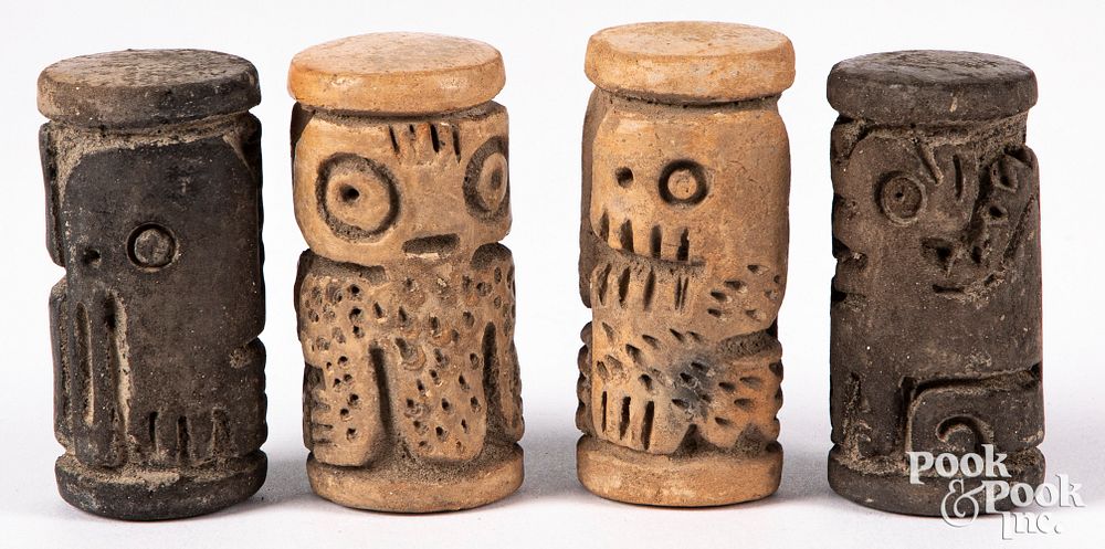 Appraisal: Ecuadorian carved ceramic cylinders Ecuadorian carved ceramic cylinders with animal