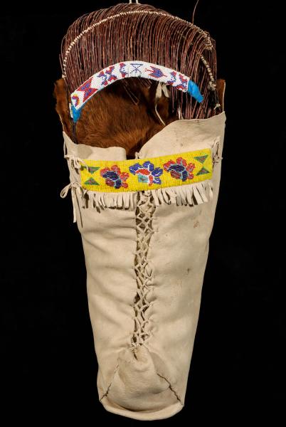 Appraisal: A TANNED HIDE AND BEADWORK UTE CRADLEBOARDThe full-sized powwow era