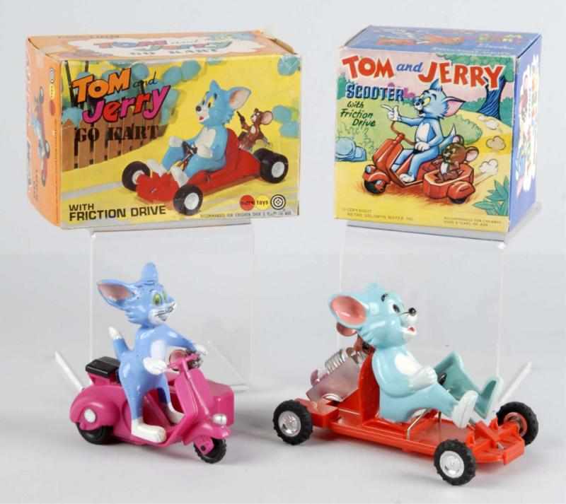 Appraisal: Lot of Plastic Marx Tom Jerry Vehicle Toys Description American