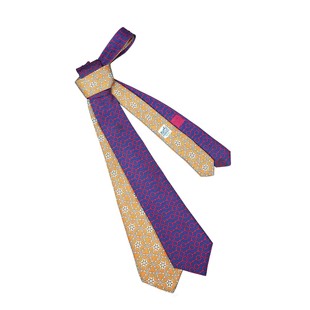 Appraisal: Two Hermes Style Neckties Comprising a cinnamon and pale blue