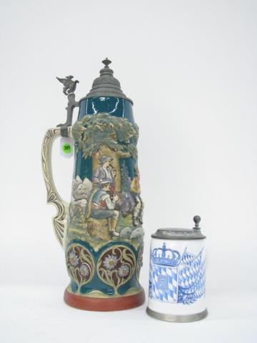 Appraisal: Two lidded German drinking vessels including scenic three-and-a-half liter and