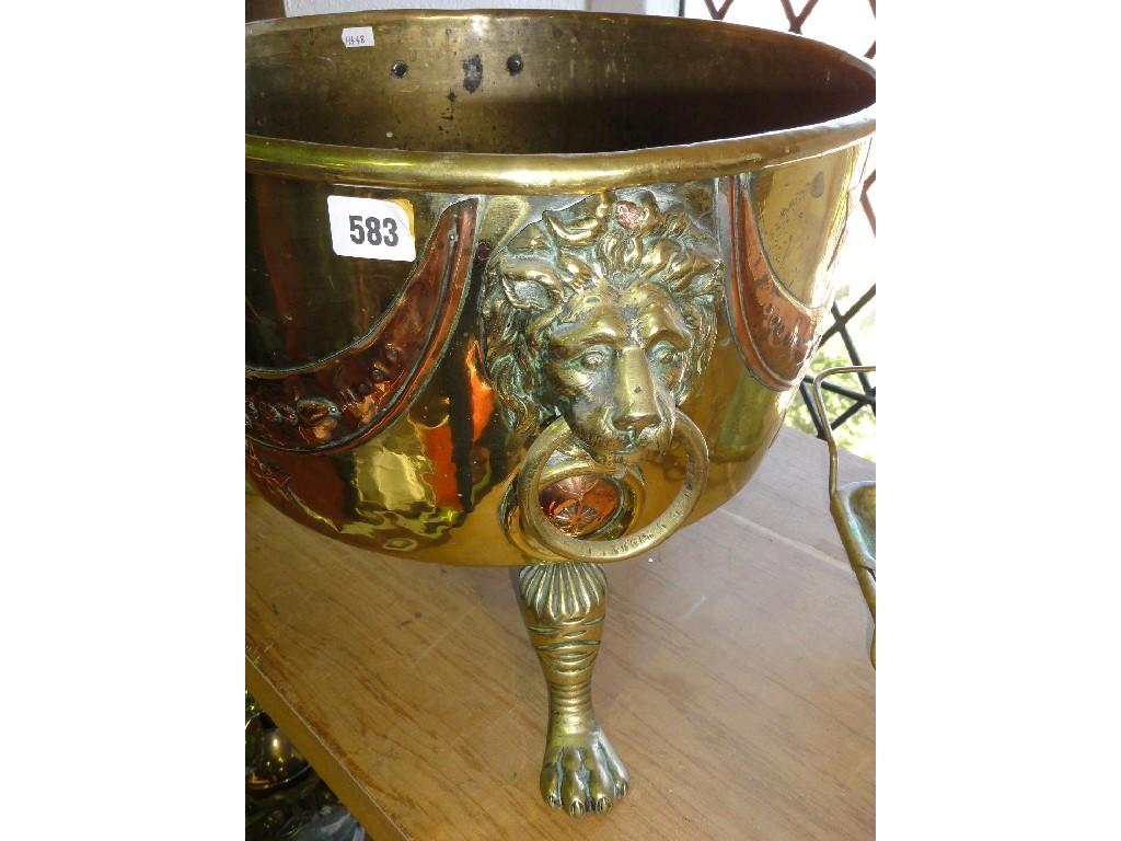 Appraisal: A th century copper coal cauldron with lion mask ring