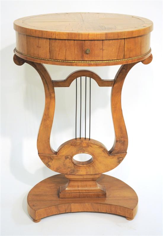 Appraisal: Italian walnut single drawer table round top lyre pedestal base