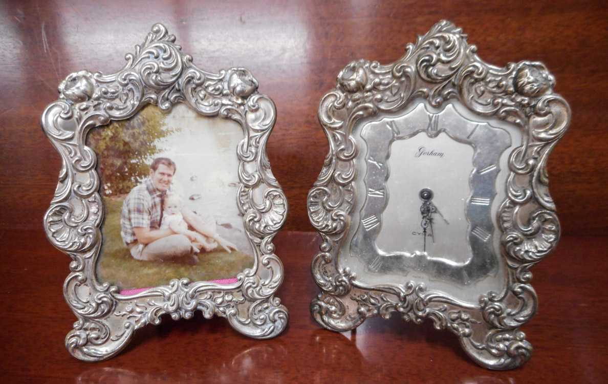 Appraisal: GORHAM STERLING SILVER PICTURE FRAME AND CLOCK SET in matching