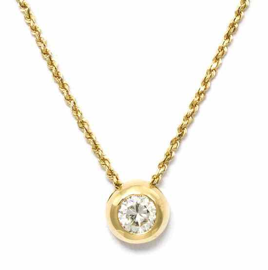 Appraisal: A Karat Yellow Gold and Diamond Pendant Necklace containing one