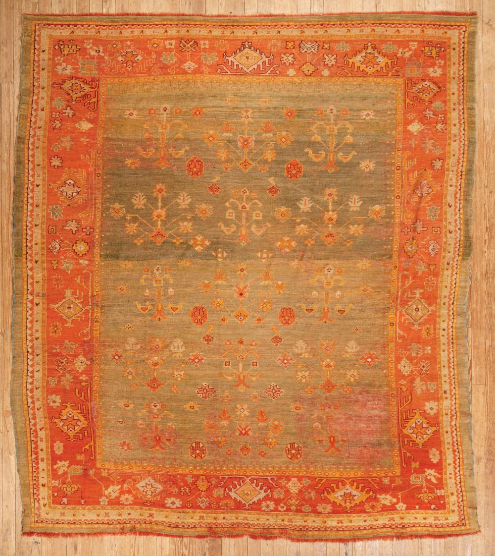 Appraisal: Antique Persian Carpet green central medallion red border repeating stylized