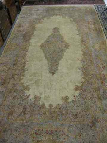 Appraisal: Kirman Persian Handmade Room Size rug soft colors fine floral