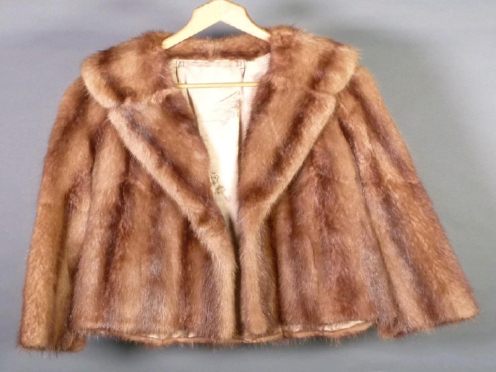 Appraisal: BROWN MINK DYED MUSQUASH JACKET with revered collar small slit