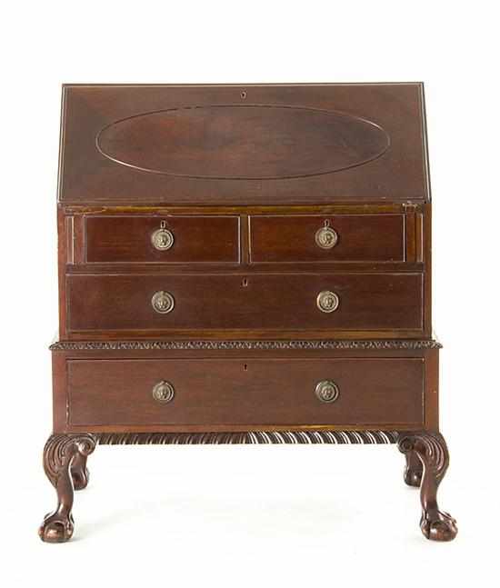 Appraisal: Georgian style carved mahogany slantfront desk early th century rectangular