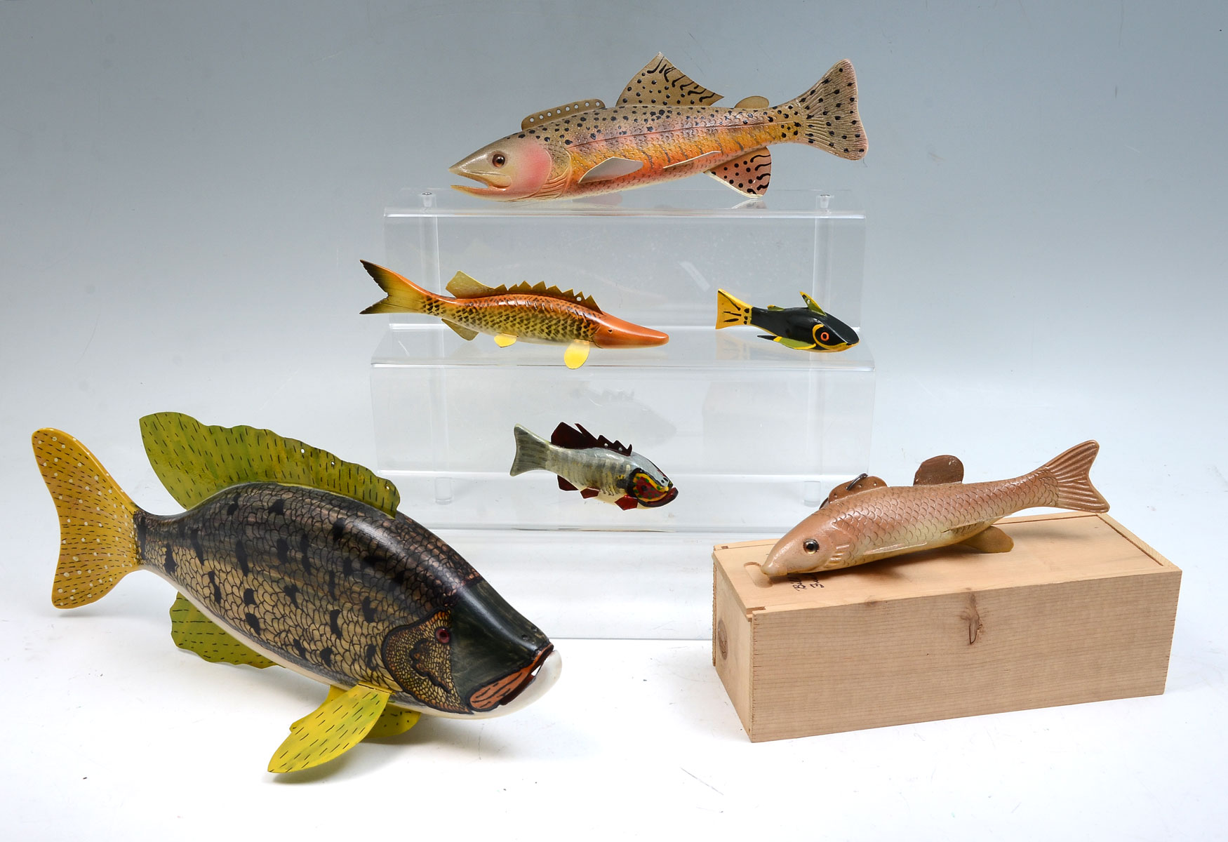 Appraisal: SIX HAND-CARVED AND PAINTED FISH DECOYS Four Decoys by Duane