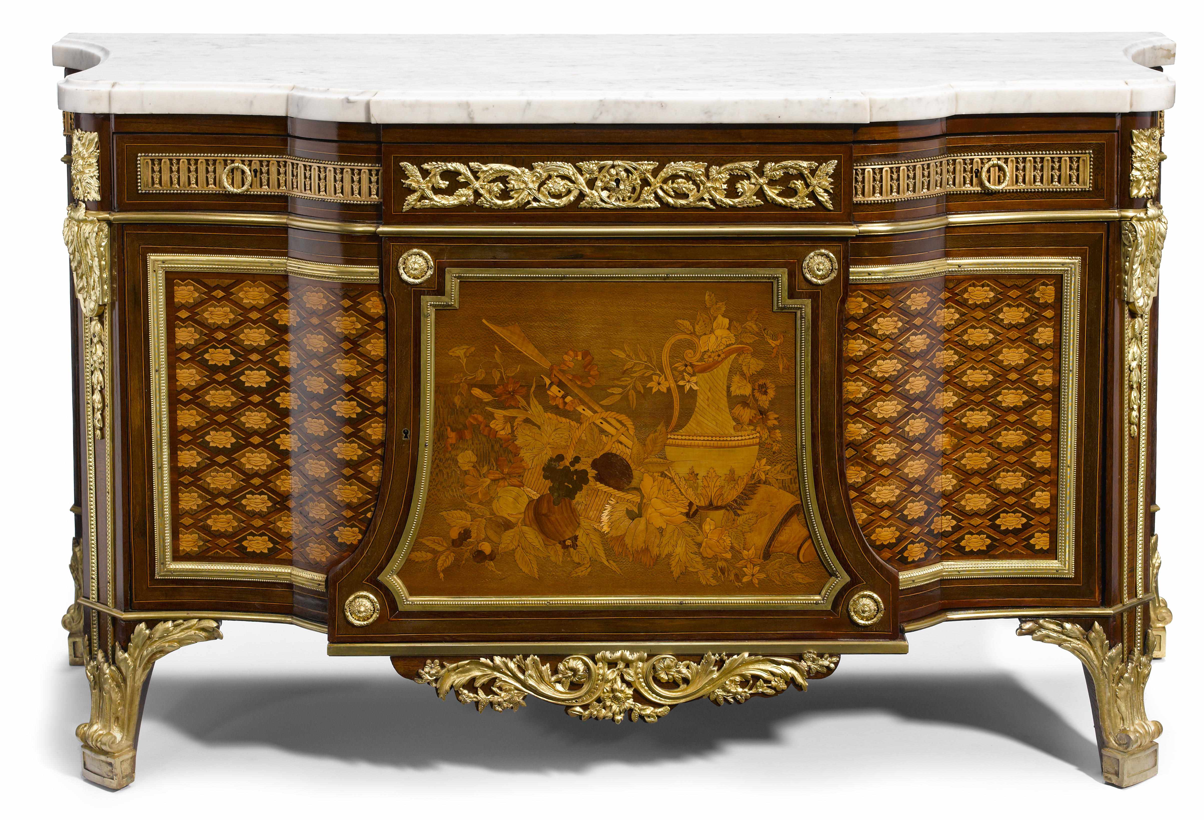 Appraisal: A Louis XVI style gilt bronze mounted marquetry inlaid mahogany