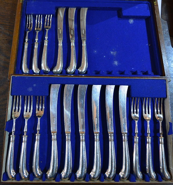 Appraisal: A part set of nine silver plated fruit knives and