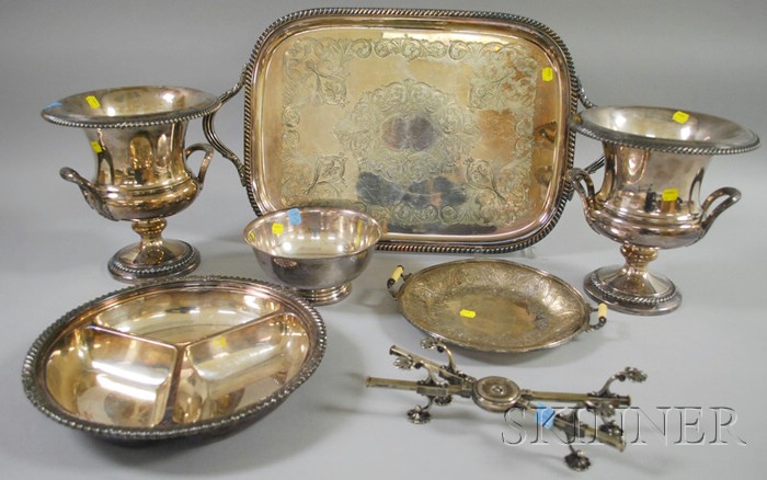 Appraisal: Seven Silver-Plated Serving Items two silver-plated urn-form wine coolers both