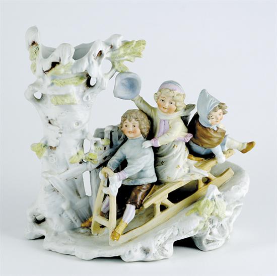 Appraisal: Painted bisque figural vase depicting children on sleigh ride H