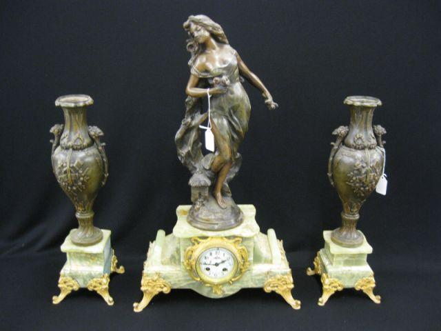 Appraisal: French Victorian Figural Mantle Clock Set bronzed maiden urns above