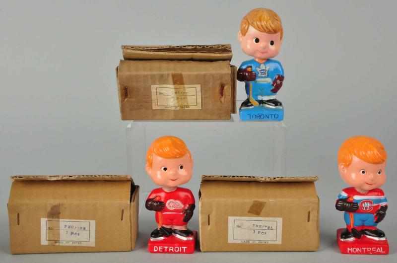 Appraisal: Lot of Hockey Mini Bobbing Head Dolls Description Old store