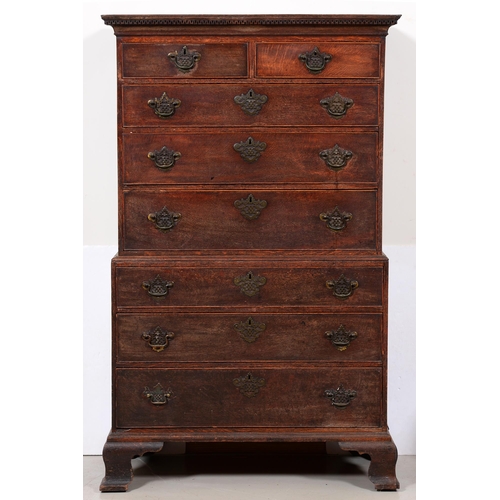 Appraisal: A George III oak chest-on-chest the dentil cornice above two