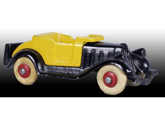 Appraisal: Cast Iron Hubley Take-Apart Roadster Toy Car Description Yellow and