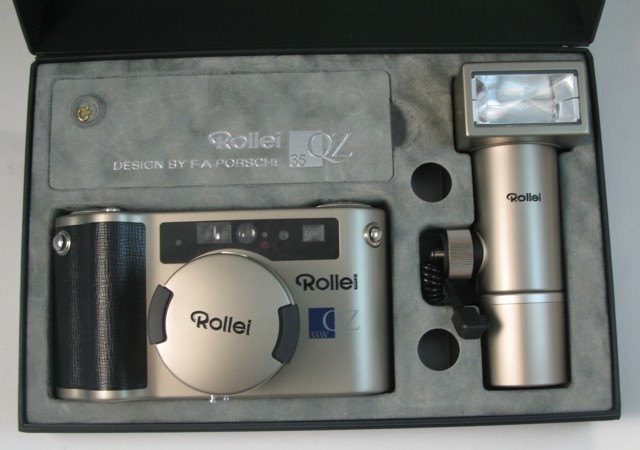 Appraisal: ROLLEI QZ W mm CAMERA Titanium and leather covered body