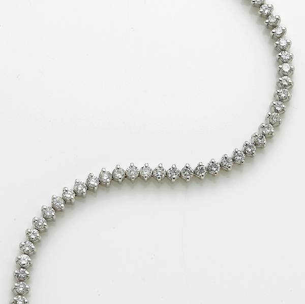 Appraisal: A diamond and k white gold line bracelet estimated total