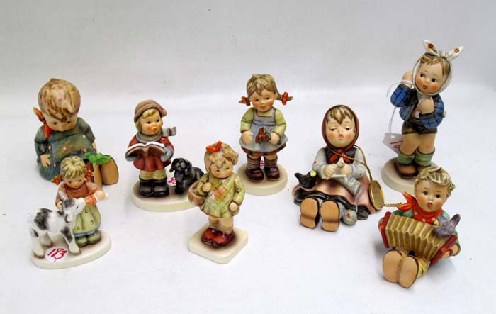 Appraisal: EIGHT GERMAN HUMMEL PORCELAIN FIGURINES TM- - Boy With Toothache