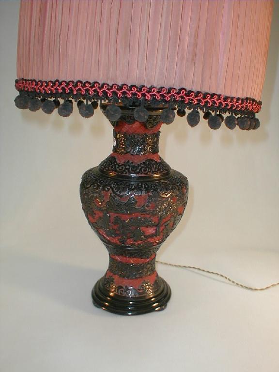 Appraisal: A table lamp of baluster form with fret cut Chinese