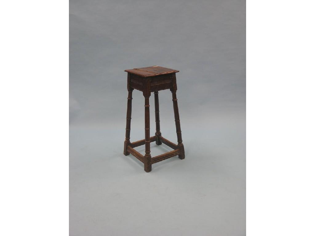 Appraisal: An early th century oak stool tall tapering form with