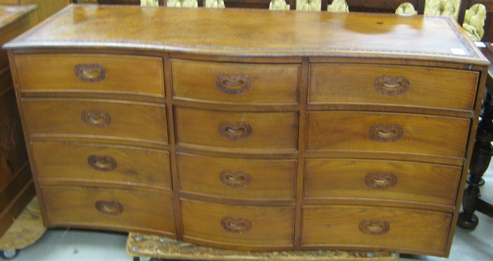 Appraisal: CARVED TEAKWOOD TWELVE-DRAWER CREDENZA Kashmir India mid th century the