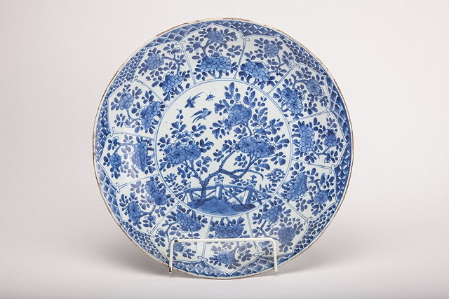 Appraisal: A CHINESE BLUE AND WHITE CHARGER central panel with blossom