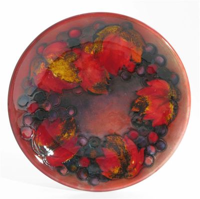 Appraisal: Flambe Leaf and Berry' a Moorcroft Pottery plate painted in