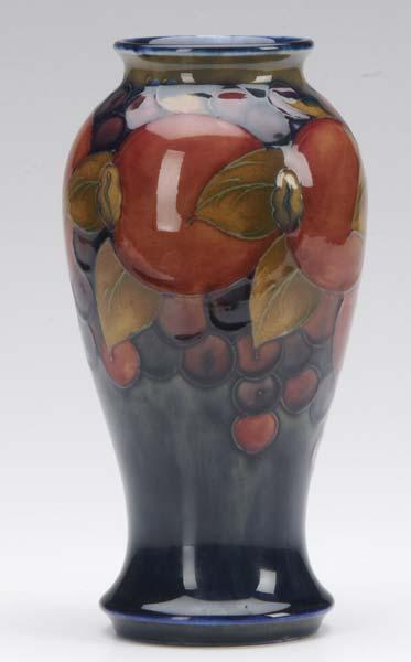 Appraisal: MOORCROFT Pomegranate vase Impressed marks and blue signature