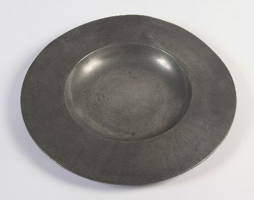 Appraisal: An early th century plain pewter dish plain bouge deep