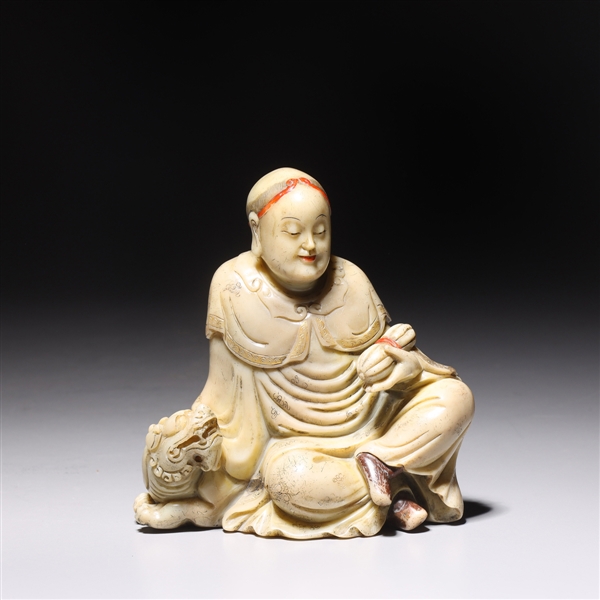 Appraisal: Chinese carved soapstone seated figure some gilt and polychrome overall