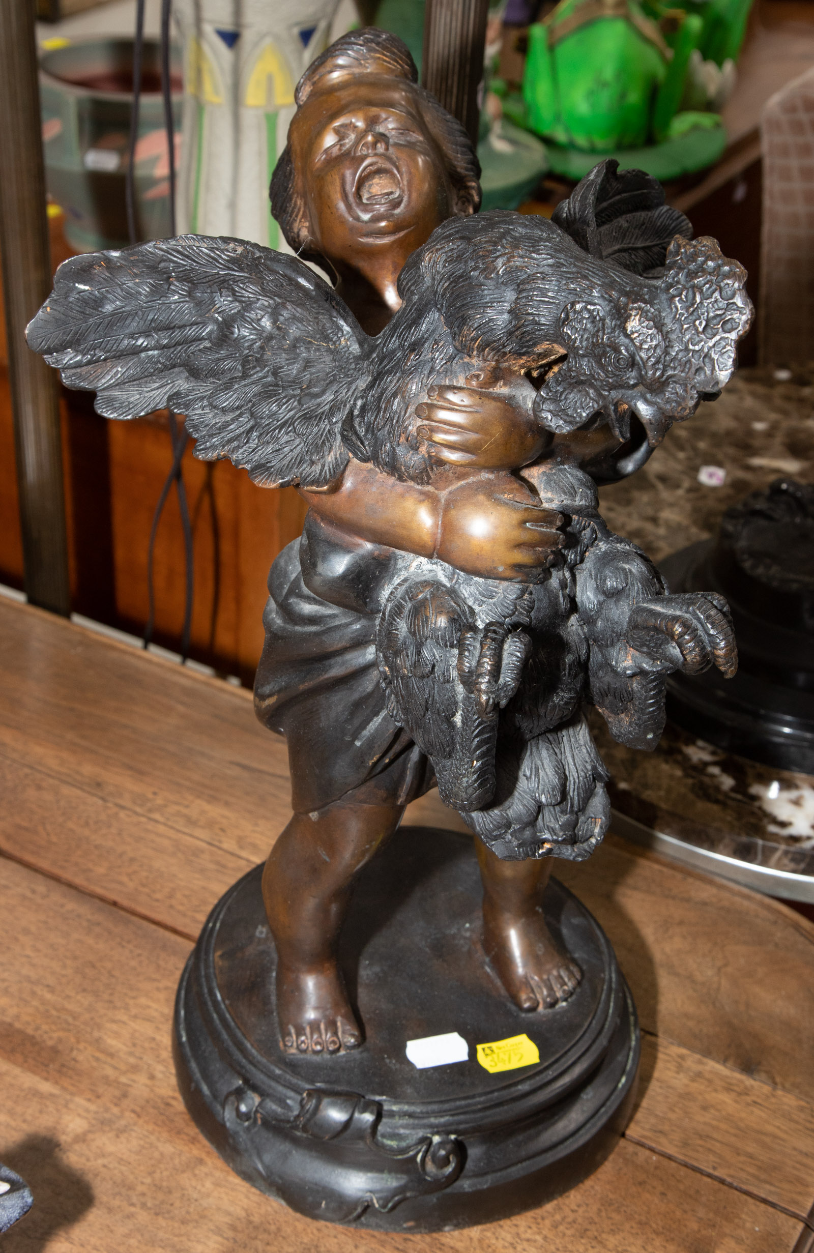 Appraisal: MODERN BRONZE SCULPTURE BOY WITH A ROOSTER in H