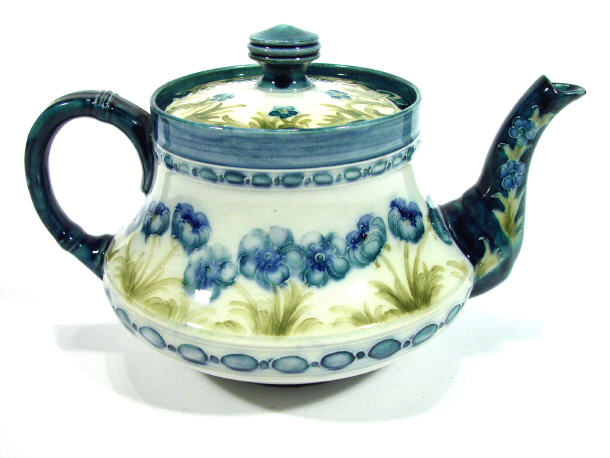 Appraisal: Moorcroft McIntyre Florianware teapot hand painted and tubelined with blue