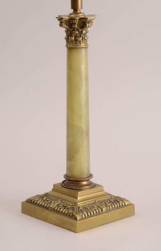 Appraisal: NEOCLASSICAL STYLE BRASS-MOUNTED ONYX COLUMN-FORM TABLE LAMP With Corinthian capital