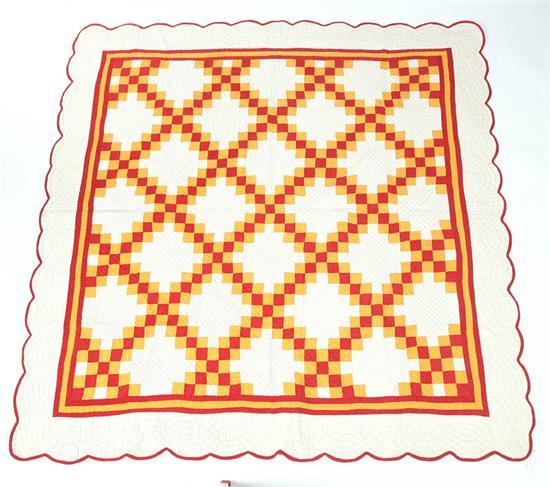 Appraisal: TRIPLE IRISH CHAIN QUILT Early th century bright colors handquilted