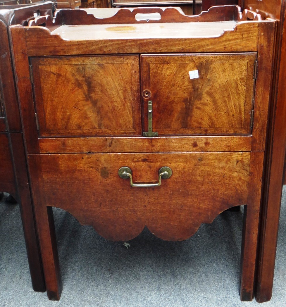 Appraisal: A George III mahogany tray top night commode with a