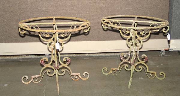 Appraisal: A pair of Baroque style polychromed wrought iron tables modern