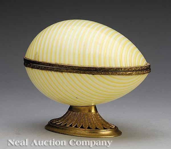 Appraisal: A Venetian Bronze-Mounted Yellow and White Striped Murano Glass Egg