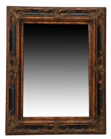 Appraisal: Decorative parcel gilt wall mirror late th c having molded