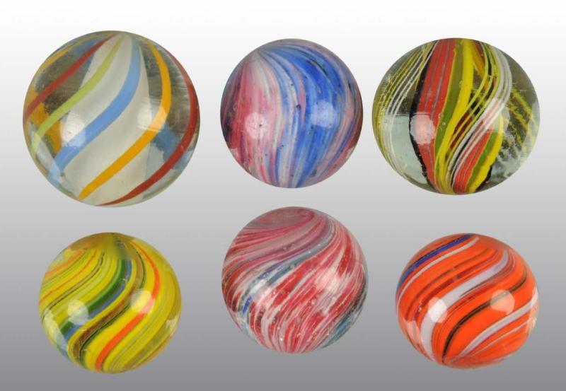 Appraisal: Lot of Hand-Made Marbles Description Includes two German swirls two