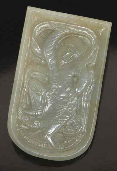 Appraisal: Chinese Ming carved jade belt boarddepicting a dancer ''H x