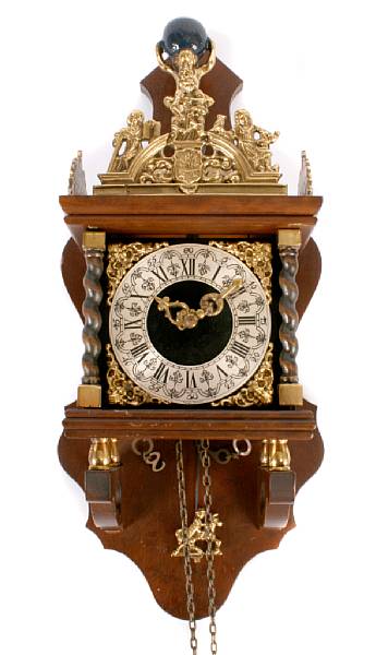 Appraisal: A Dutch Baroque style mahogany and brass wall clock together