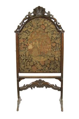 Appraisal: An th century French carved walnut adjustable firescreen with an