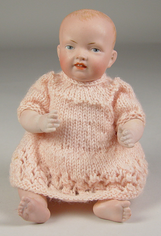 Appraisal: German All-Bisque Character Baby Painted blue eyes Stroked brow Open