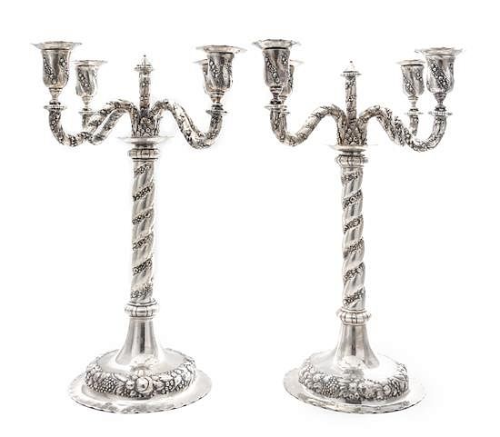 Appraisal: A Pair of German Silver Four-Light Candelabra Early th Century