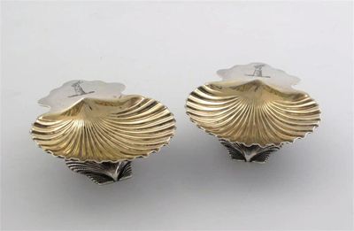 Appraisal: A pair of Victorian scallop shell salts with gilt bowls