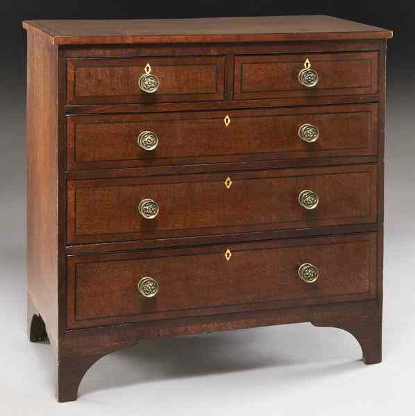 Appraisal: English oak and ebony inlaid chest of drawers the top