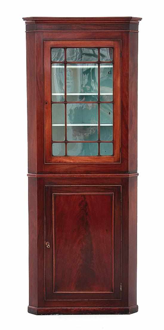 Appraisal: Georgian mahogany corner cupboard late th early th century molded